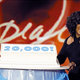 Winfrey celebrates her momentous achievement on the set of her TV show.